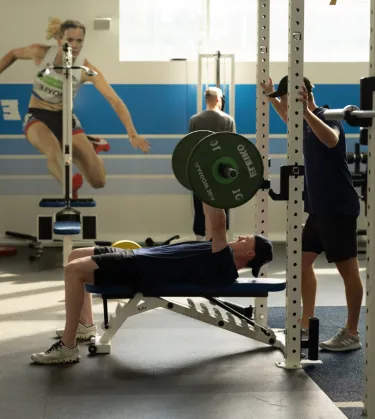 man bench pressing 