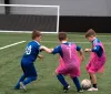 boys playing football